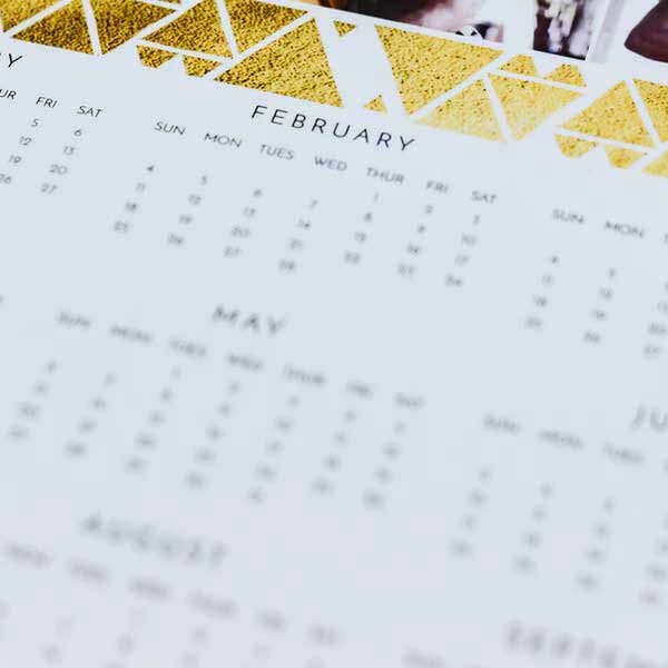 Close-up of calendar showing months